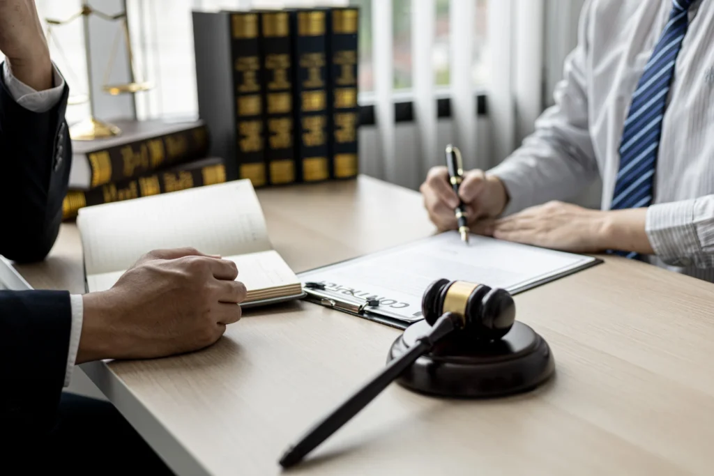 A lawyer for personal injury calculating damages for client
