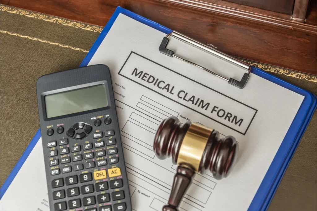 Medical malpractice claims form on the desk of a lawyer