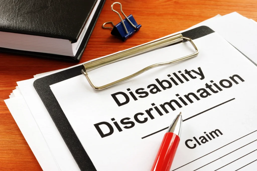 A disability discrimination claim form on a desk